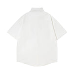 Short-sleeved shirt with small embroidered flowers