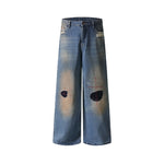 Distressed straight jeans