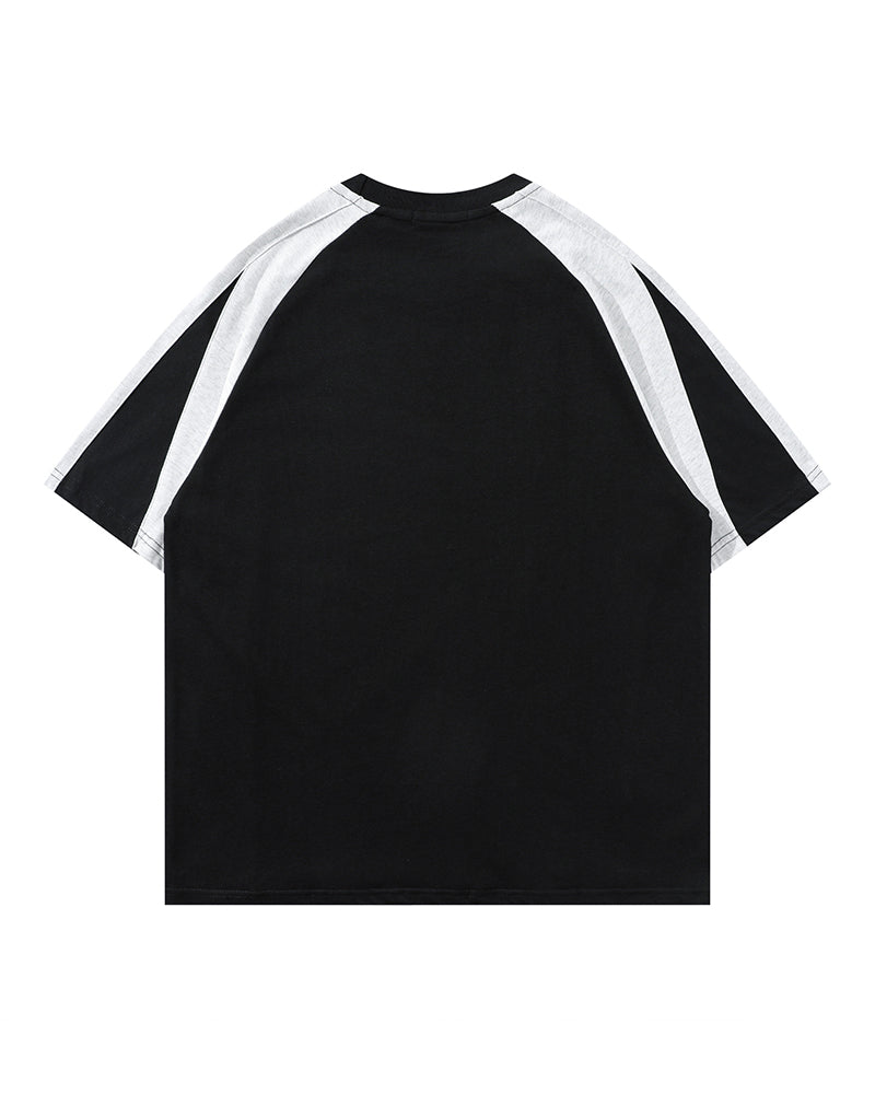 루즈한 반소매와 대비되는 레트로 패치워크