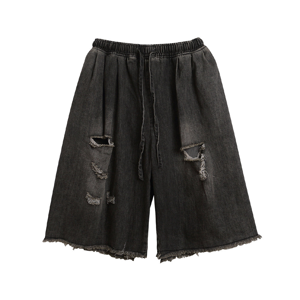 Ripped raw-edge denim shorts