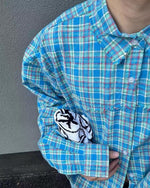 embroidered paneled long-sleeved shirt