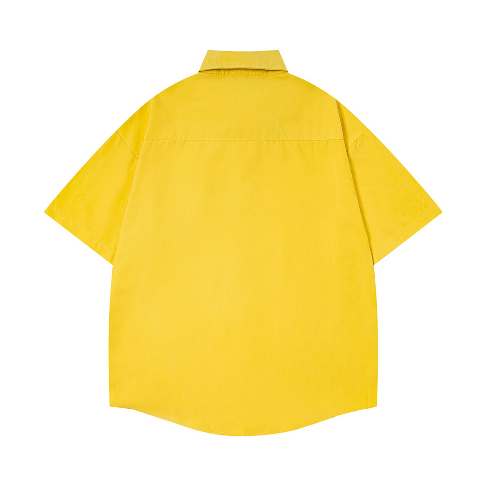 Short-sleeved shirt with small embroidered flowers