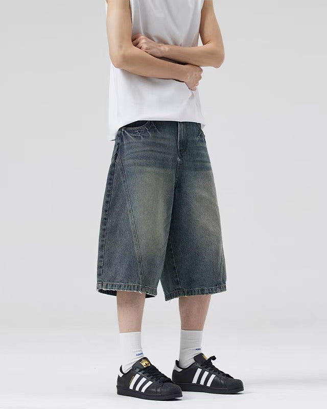 Paneled distressed cropped shorts