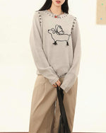 Short knitted sweater (women's style)