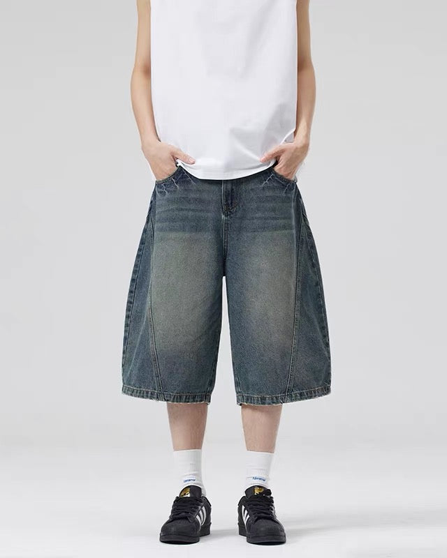 Paneled distressed cropped shorts