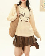 Short knitted sweater (women's style)