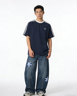 Distressed Embroidered Jeans