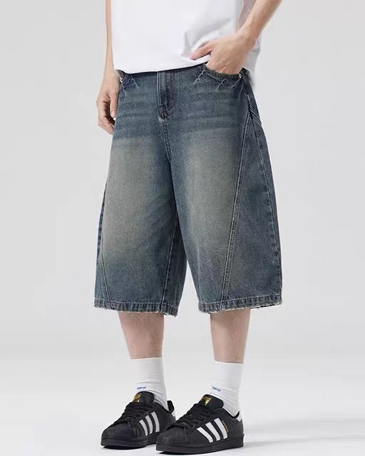 Paneled distressed cropped shorts