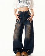 Washed distressed denim trousers