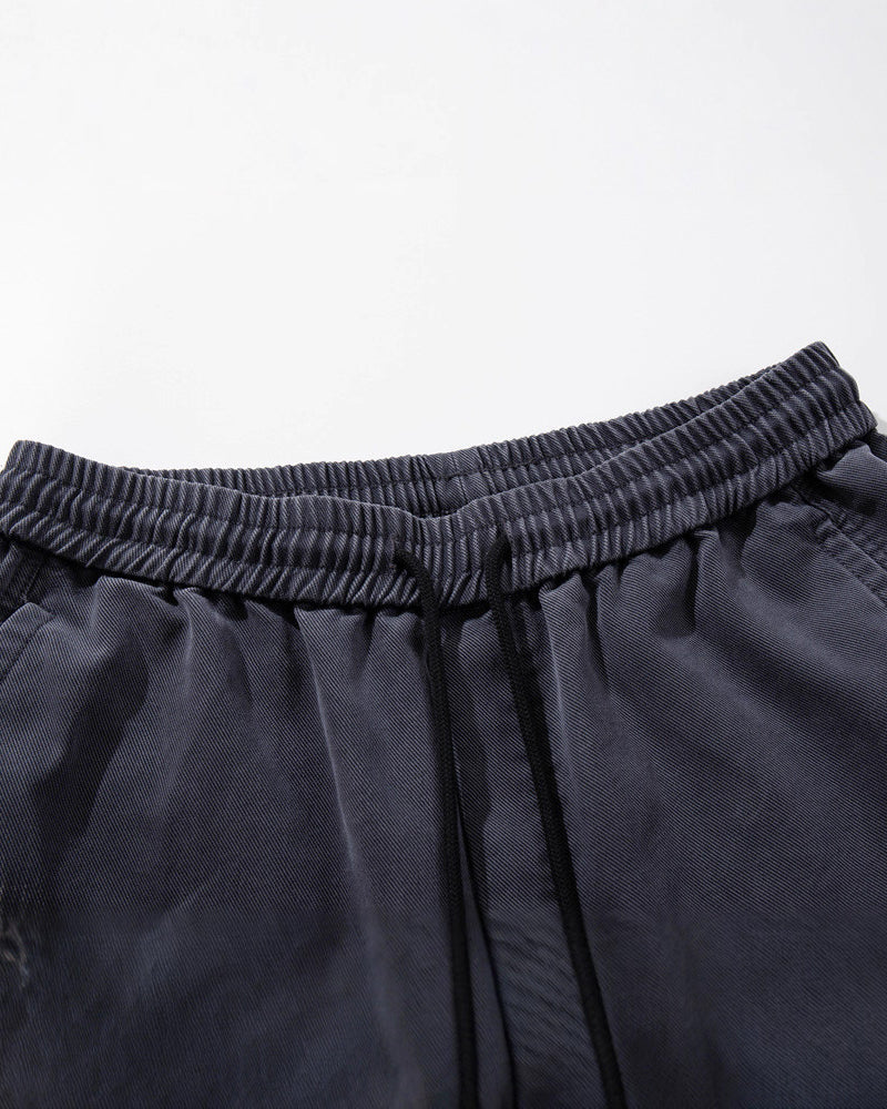 Distressed multi-pocket sweatpants