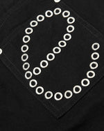 ウォッシュ加工を施したダメージ加工のカプリショーツ