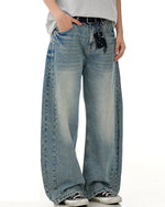 水洗彎刀牛仔褲