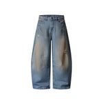 Distressed ripped denim trousers