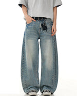 水洗彎刀牛仔褲