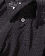 Embroidered striped trousers