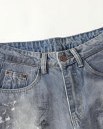 Distressed hand-painted jeans
