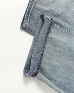 Loose-fitting washed denim jeans