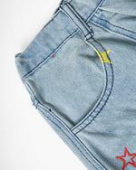 Washed leopard print jeans