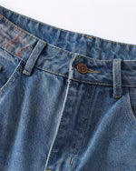 Distressed gradient jeans