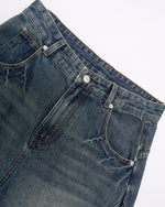 Paneled distressed cropped shorts