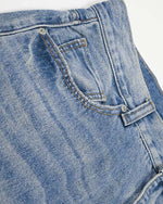 Distressed straight jeans