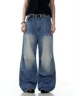 Distressed washed straight jeans