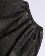 Ripped raw-edge denim shorts