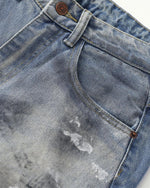 Distressed hand-painted jeans