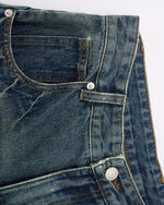 Paneled distressed cropped shorts