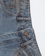 Distressed ripped denim trousers