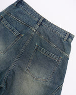 Paneled distressed cropped shorts