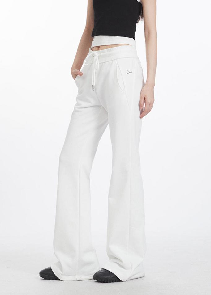 Embroidered low-rise slim fit flared trousers (women's style)