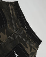 Distressed patchwork camouflage trousers