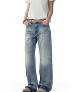 Washed distressed gradient trousers
