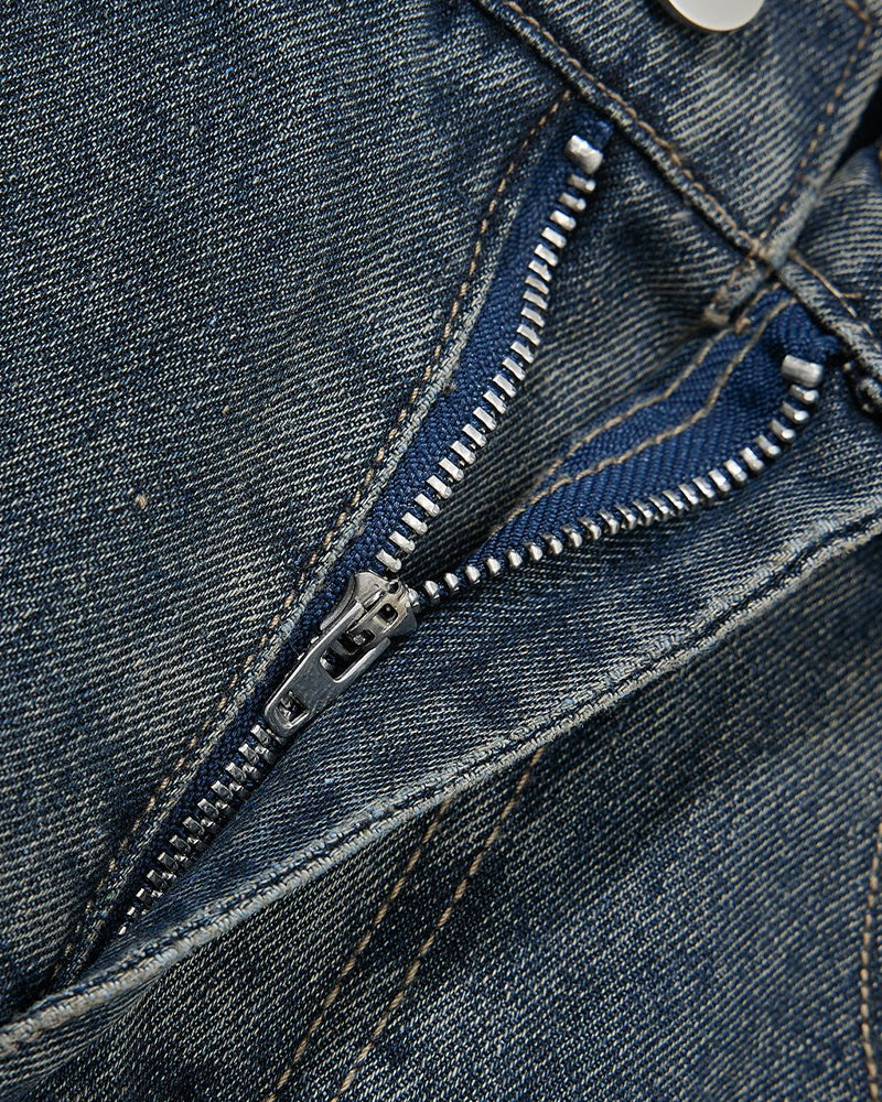 Distressed multi-pocket jeans