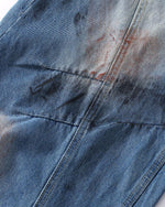 Distressed gradient jeans