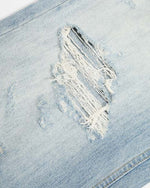 Distressed raw-edge jeans