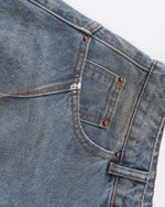 Distressed ripped denim trousers