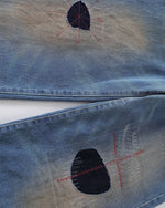 Distressed straight jeans