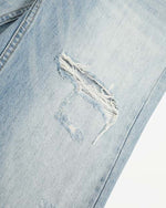Distressed raw-edge jeans