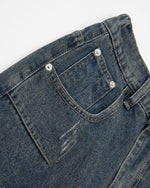 Distressed multi-pocket jeans