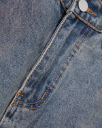 Distressed straight jeans