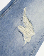 Distressed straight jeans