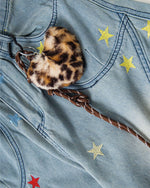 Washed leopard print jeans