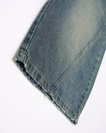 Paneled distressed cropped shorts