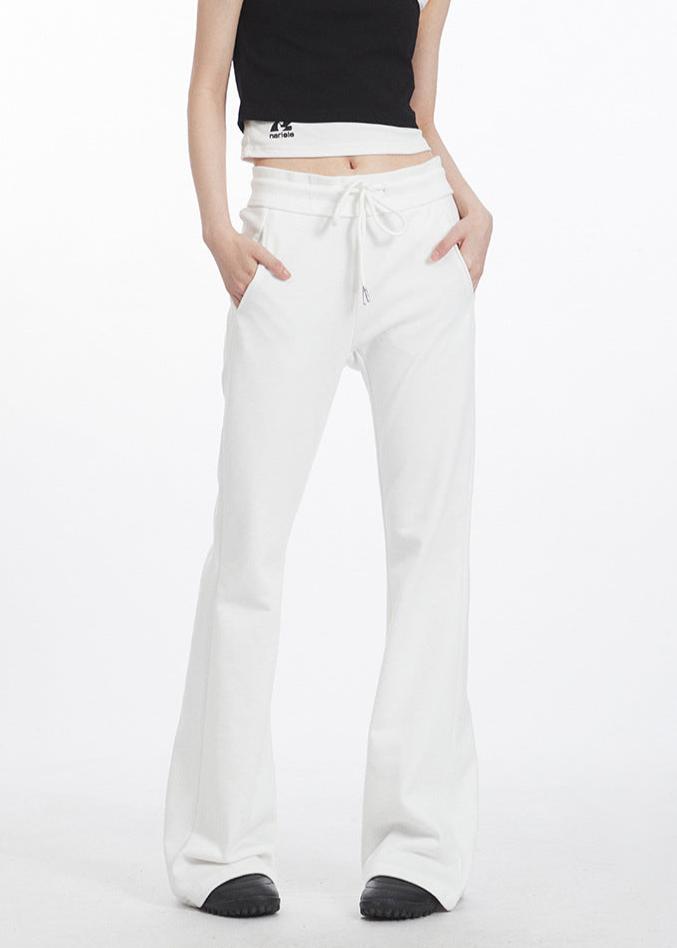 Embroidered low-rise slim fit flared trousers (women's style)