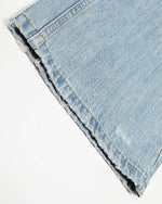Distressed raw-edge jeans