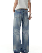 Washed distressed gradient trousers