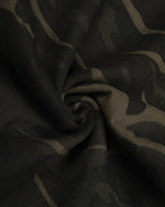 Distressed patchwork camouflage trousers