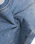 Distressed straight jeans